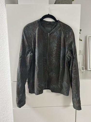 Gemusterte dunkelgrüne jacke - gemusterte,